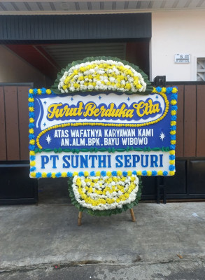 Papan Bunga Duka di Kampung Pisang