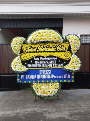 Papan Bunga Duka di Kampung Pisang